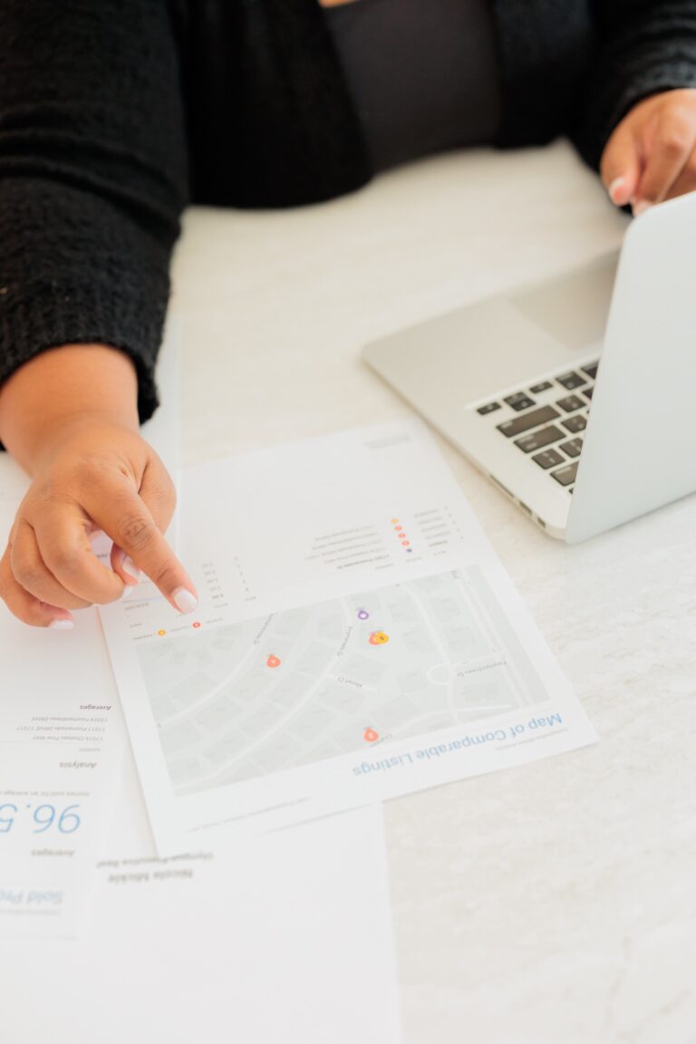 Reviewing a home maintenance schedule on a laptop