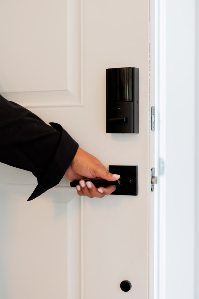 Opening a front door with a smart lock during a weekly home watch visit