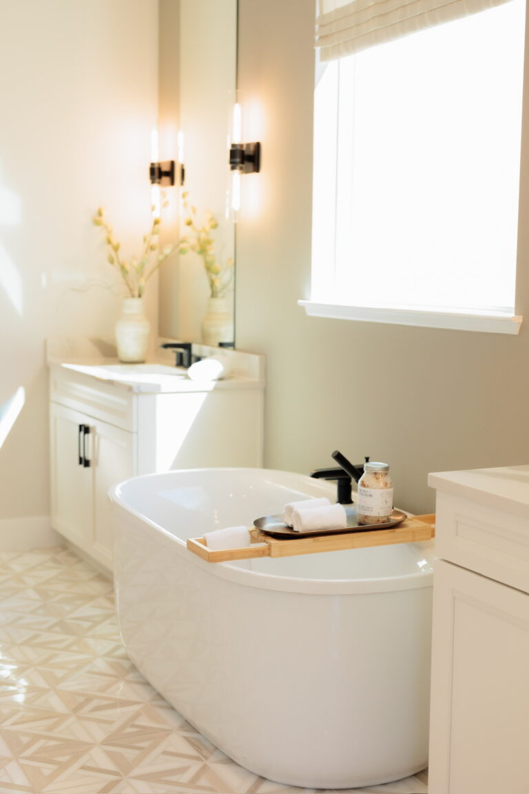 Spotless, guest-ready bathroom with a freestanding soaking tub